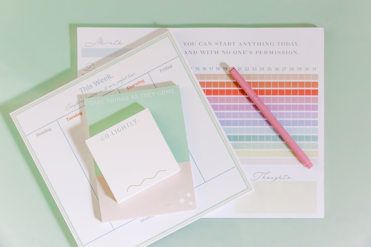 Magpie x Mamey stationery collection featuring post-its, notepad, weekly planner, and habit tracker with pink pen