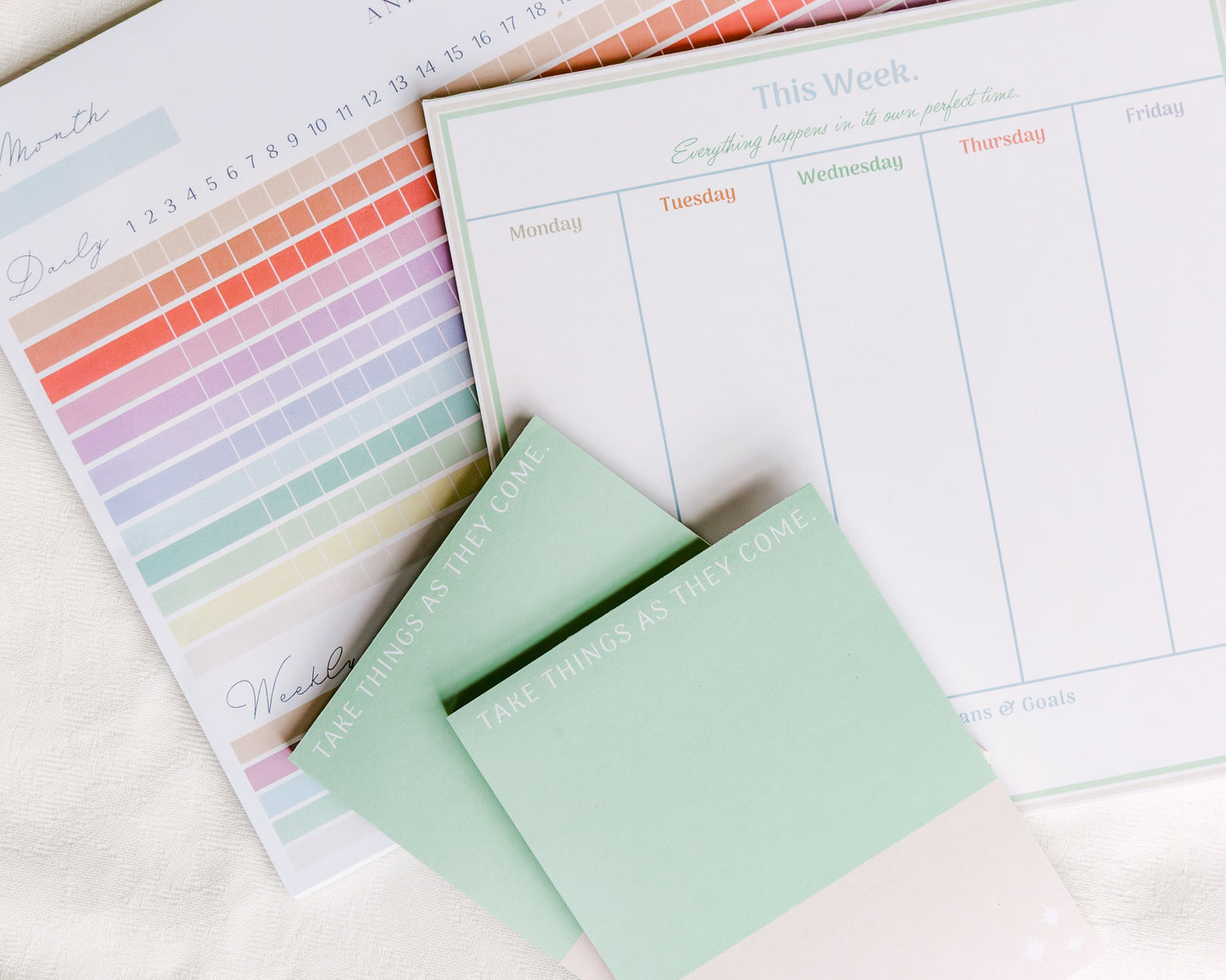 Magpie x Mamey notepad with “Take Things As They Come” design styled with weekly planner and habit tracker