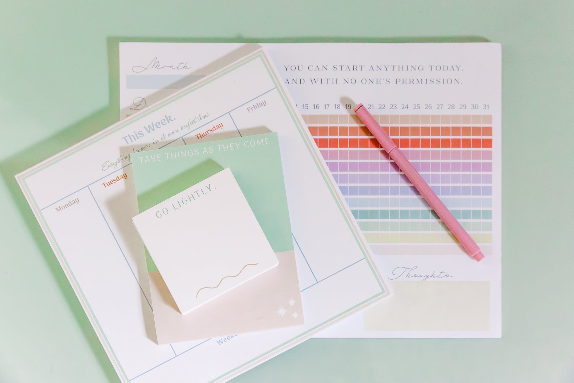 Magpie x Mamey stationery collection featuring post-its, notepad, weekly planner, and habit tracker with pink pen