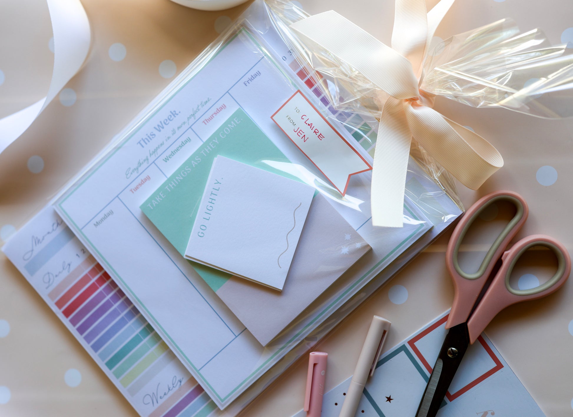 Gift-ready Magpie x Mamey Suite with cream ribbon and pastel-toned paper goods.