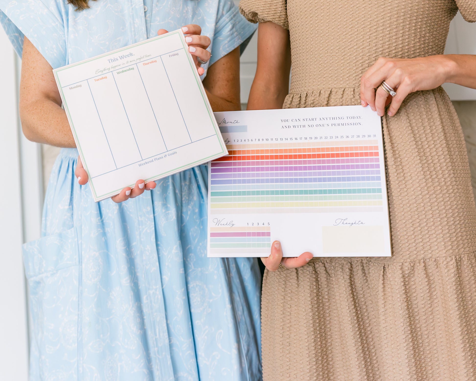 Magpie x Mamey weekly planning pad with days of the week design held by person in blue dress